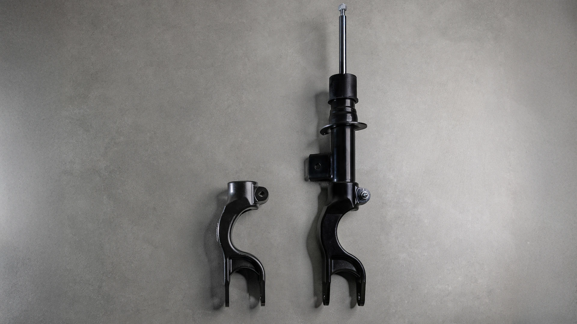 Foto von MEYLE Stoßdämpfern für Tesla.