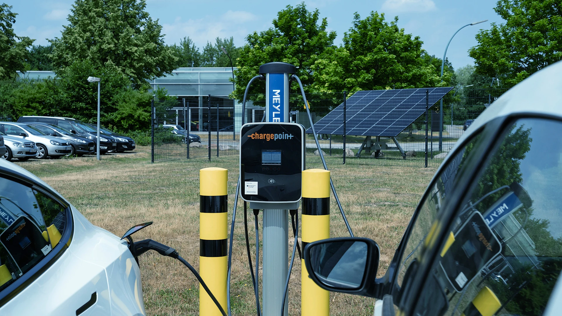Charging columns at the MEYLE headquarters in the background you can see solar cells.