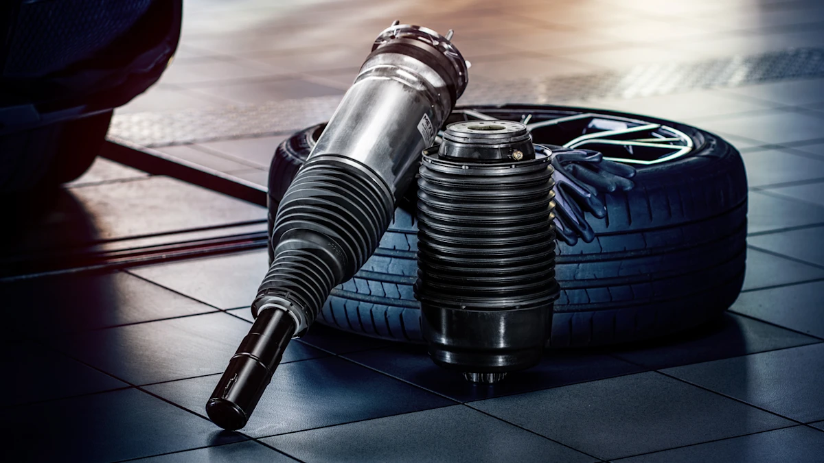 Photo of air suspension parts in a workshop environment.