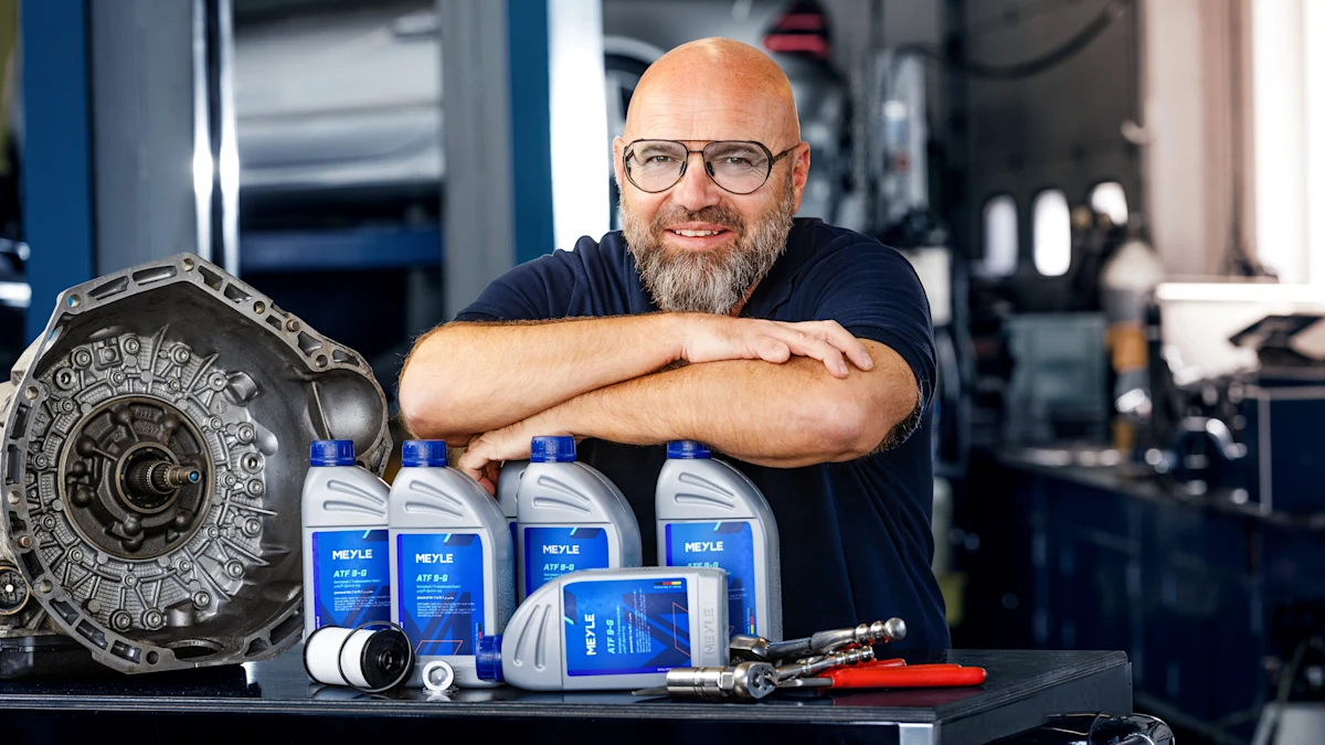 Andreas Raulf leans on the MEYLE filling device.