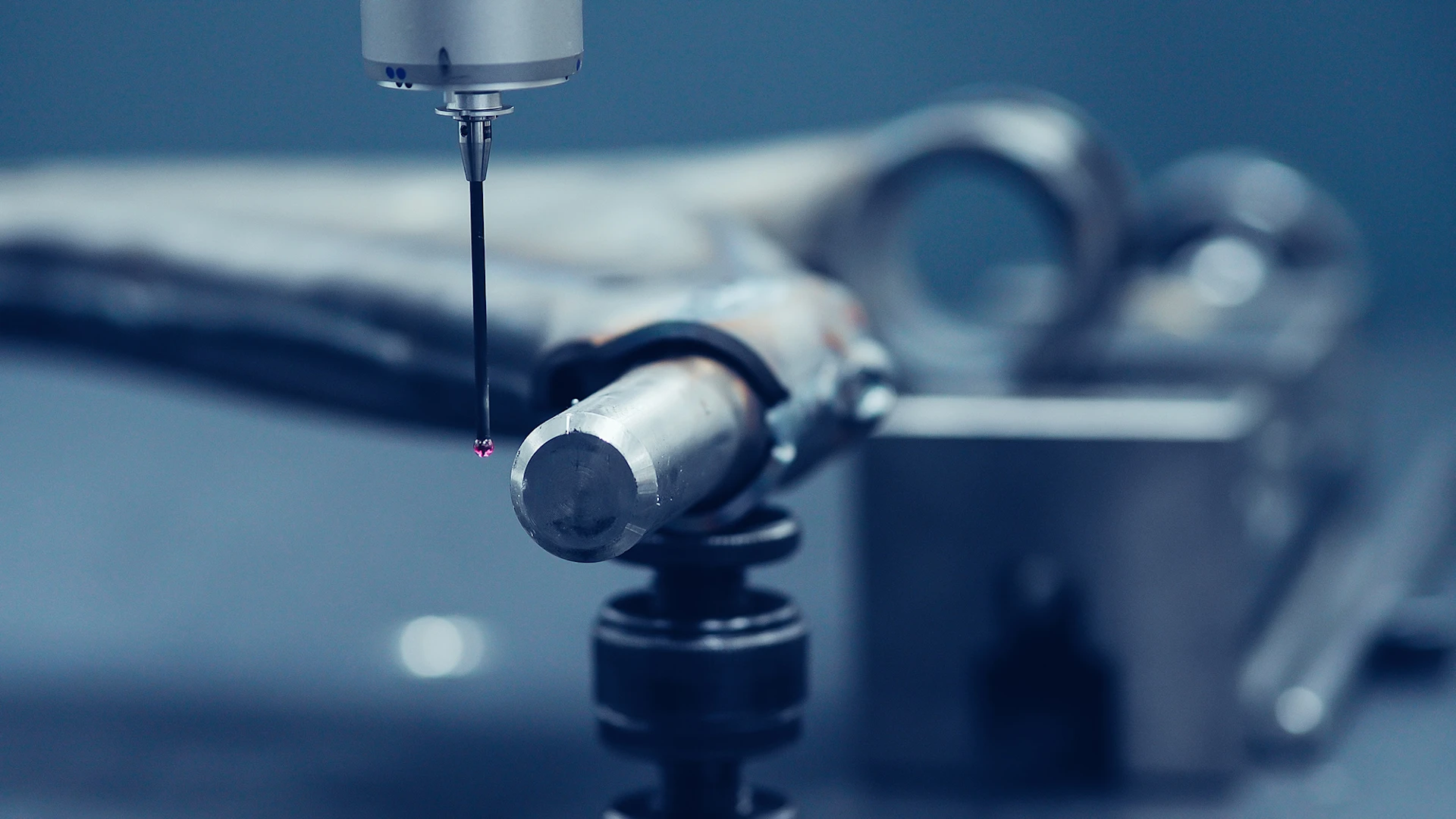 Close-up of a MEYLE part being tested by a state-of-the-art testing machine.