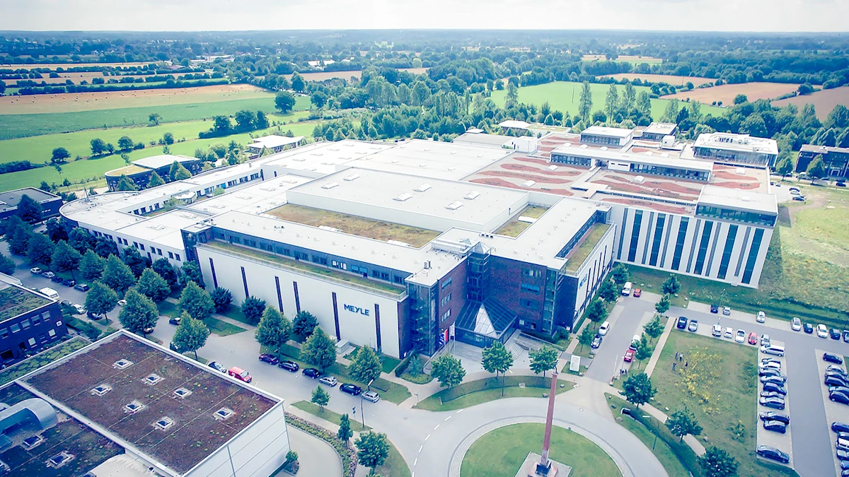 Photo of the building from above with all current construction phases.