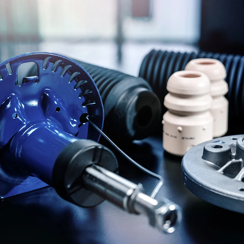 Product image of several MEYLE suspension and damping parts shown in a close-up.
