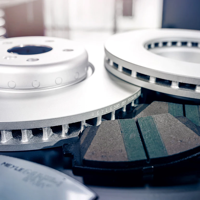 Close up of various MEYLE brake parts.