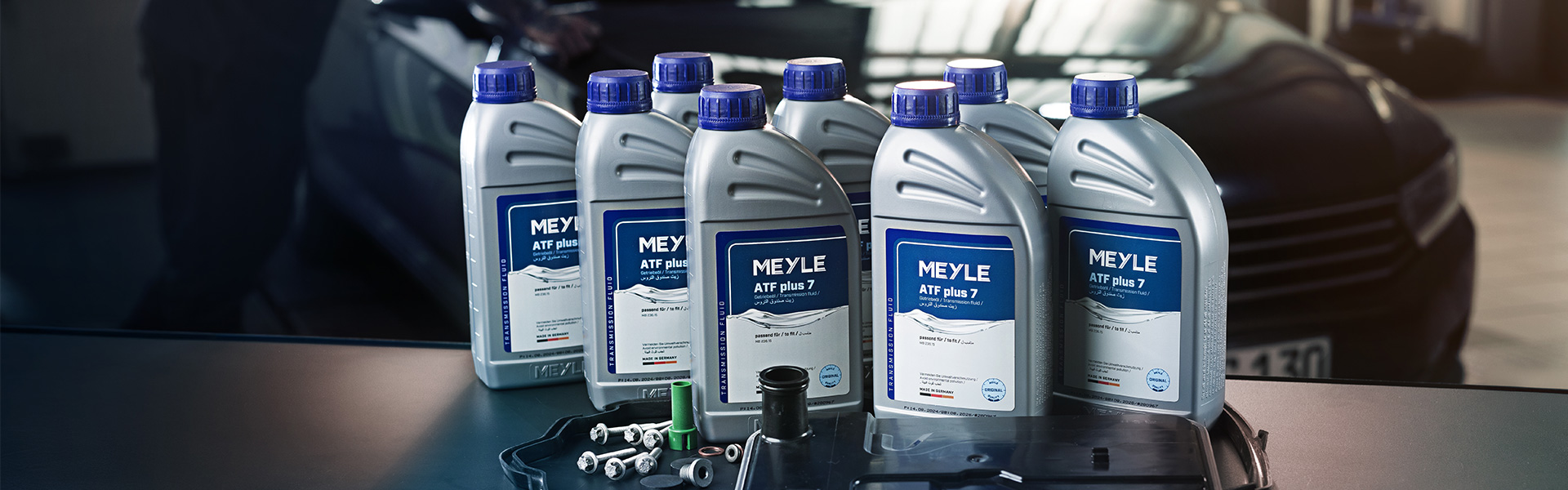 Photo of a MEYLE oil change kit in a workshop environment.
