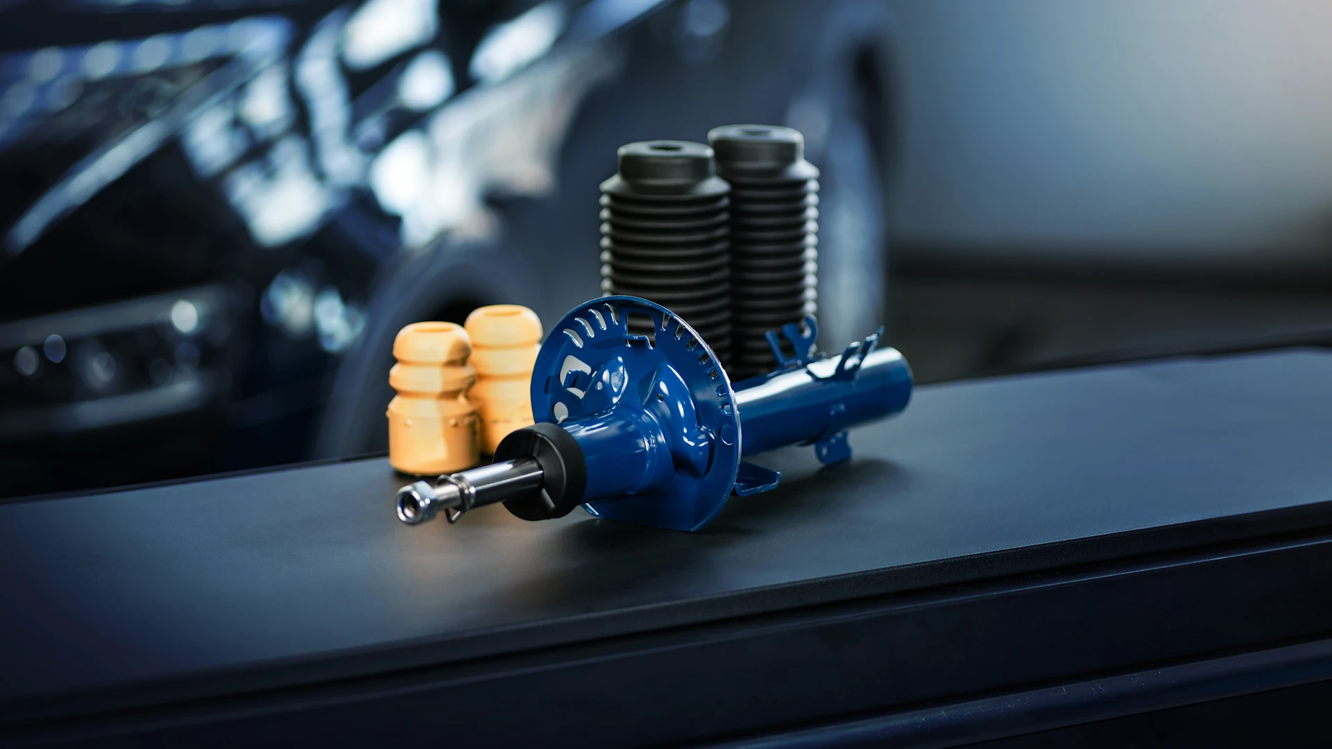 Photo of a MEYLE shock absorber on a tool trolley.