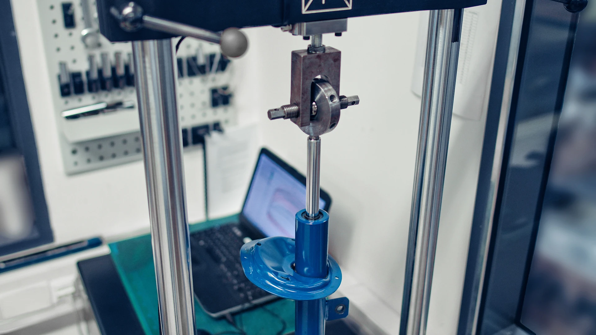 Person checks the data of a quality inspection by a machine on the monitor.