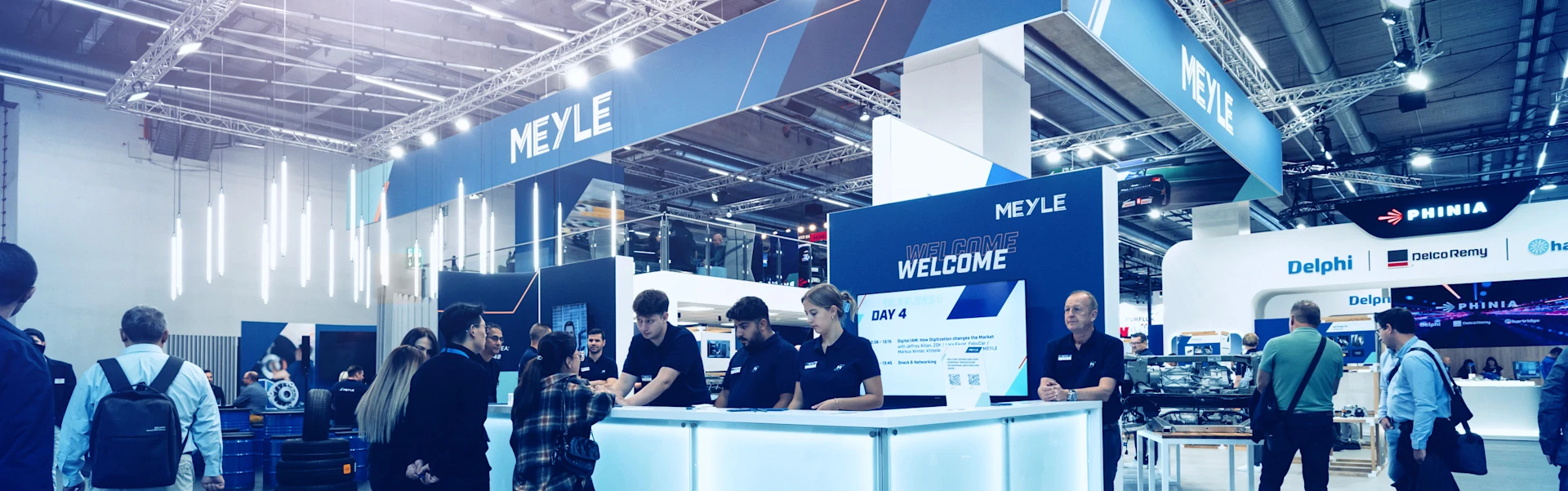 MEYLE trade fair stand with the welcome counter in focus.